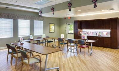 Bright common area with tables and chairs