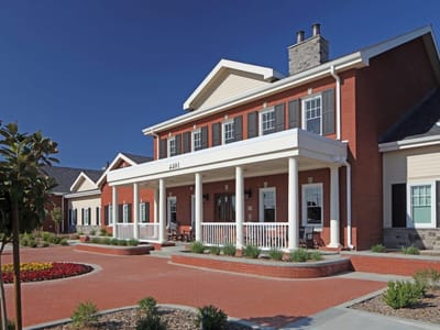 Exterior view of a senior living facility entrance