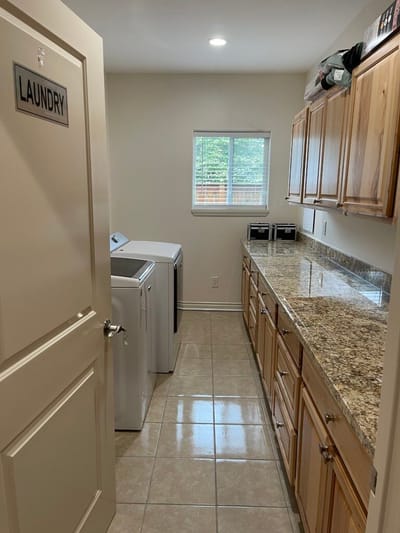 Bright interior of a laundry room with machines