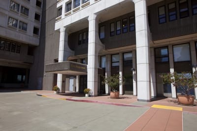 Entrance of The Sequoias San Francisco with signage