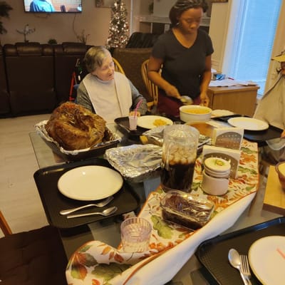 Residents enjoying a meal together in a dining area
