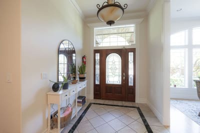 Bright interior entrance with a decorative console table