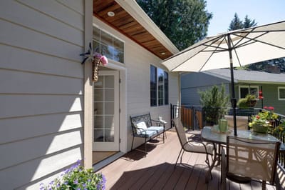 Outdoor seating area with a table and chairs