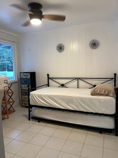 Brightly lit interior view of a resident room