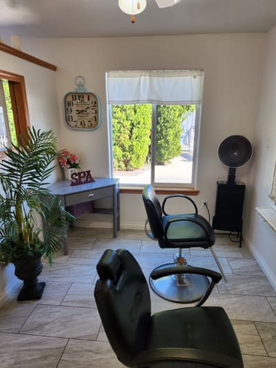 Interior view of a spa area with salon chairs