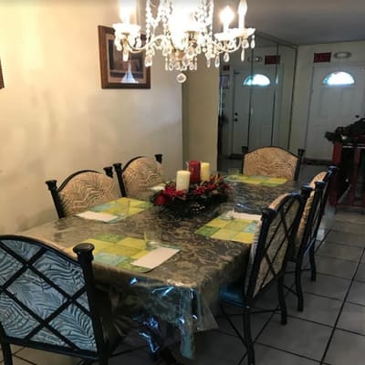 Dining table set for a meal in the facility.