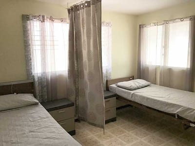 Interior view of a shared resident room with two beds