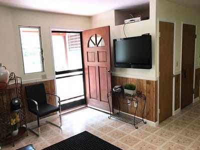Bright interior entryway with a welcoming door