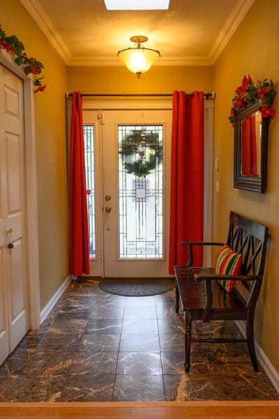 Welcoming hallway with a bench and decorative elements