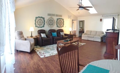 Bright common area with seating and decor