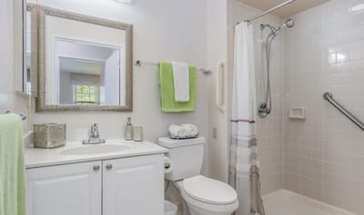 Brightly lit bathroom in a senior living facility