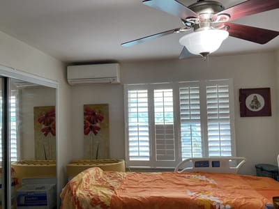 Cozy resident room with bright decor and furnishings