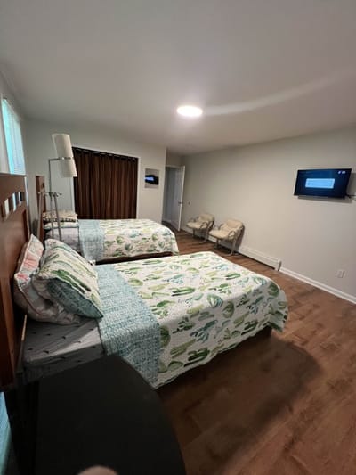 Private resident room with two beds and decor