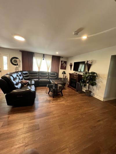 Cozy common area with leather seating and decor