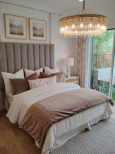 Cozy and well-decorated resident bedroom with a view