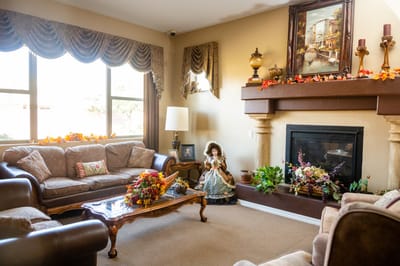 Cozy living room with comfortable seating and decorations