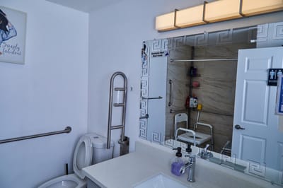 Clean bathroom with modern fixtures and accessibility features