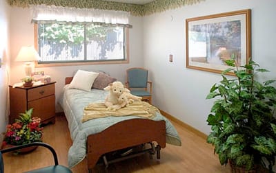 Cozy resident room with a bed and decorations