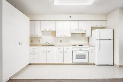 Clean kitchen in a senior living unit.