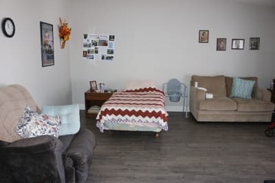 Cozy interior of a resident room with seating area