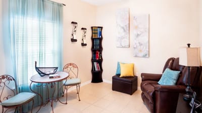 Bright common area with comfortable seating and decor