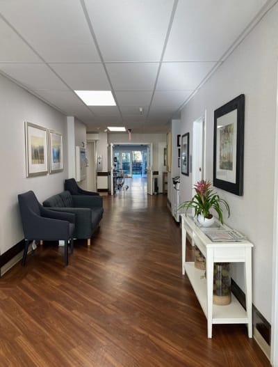 Lively interior hallway of the facility with seating