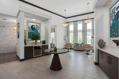 Bright interior view of a common area with artwork