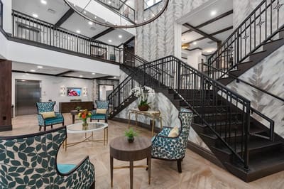 Bright and elegantly designed lobby area with seating