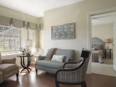A cozy living room space in a senior living facility