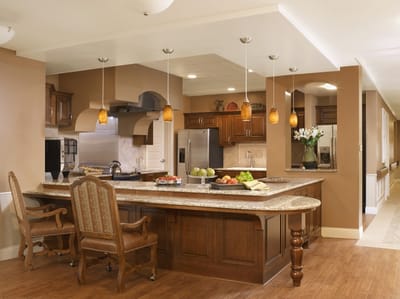 Interior kitchen area with food display and seating