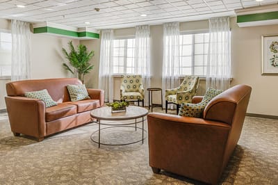 Comfortable common area with seating and natural light