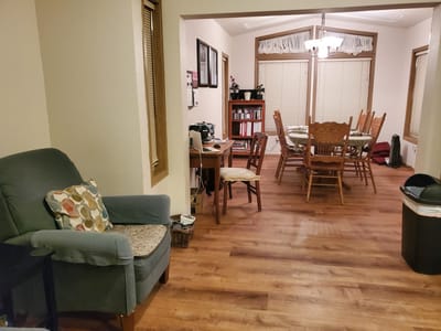 Welcoming dining area with wooden table and chairs