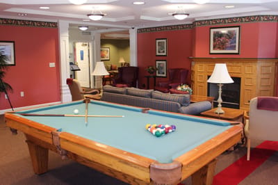 Interior view of a common area with a pool table