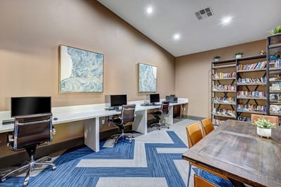 Interior of a modern communal workspace with computers