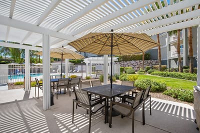 Sunny outdoor seating area with umbrellas