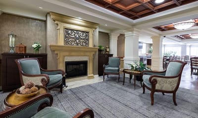 Interior common area with seating and fireplace