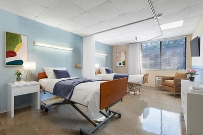 A bright, well-furnished shared room for residents
