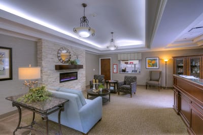 Cozy lounge area with comfortable seating and fireplace