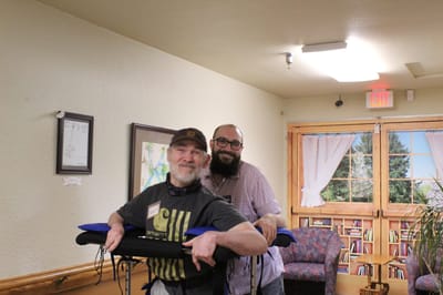Residents and staff interacting in a common area