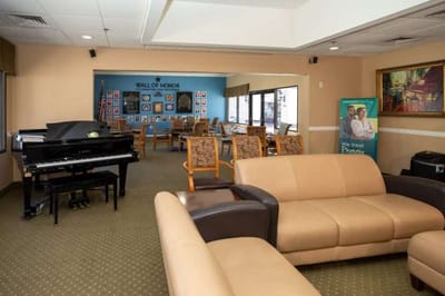 Interior common area with seating and piano