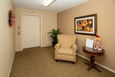 Cozy seating area in a facility hallway