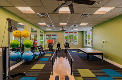 Interior view of a fitness area with equipment