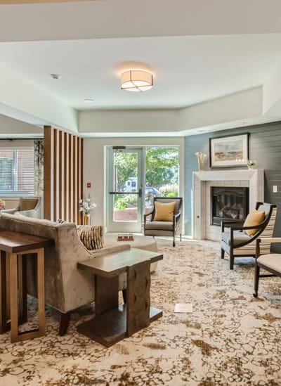 Bright common area with comfortable seating and natural light