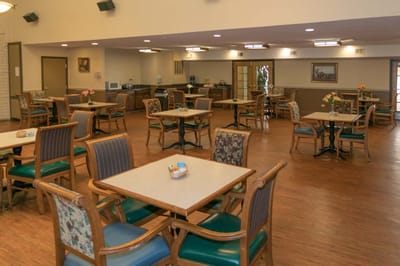 Bright dining room with tables and chairs
