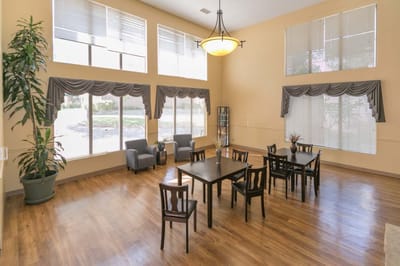 Bright common area with seating and natural light
