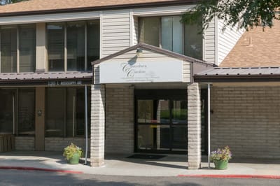 Entrance of a senior living facility with signage