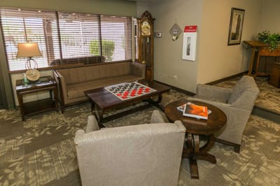 Cozy common area with seating and a game board