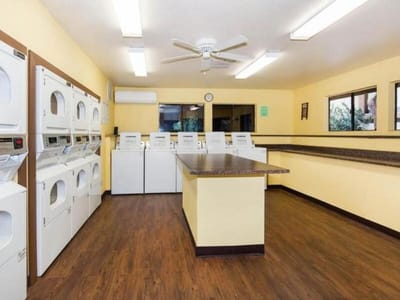 Bright interior of a laundry room with washing machines