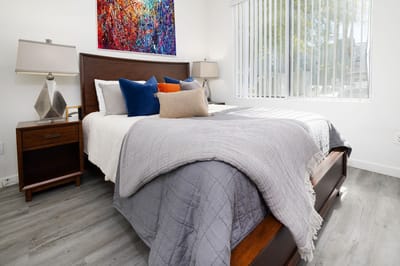 A well-decorated bedroom with modern furnishings