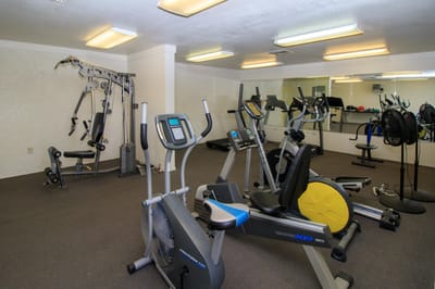 Interior view of a fitness room with exercise equipment